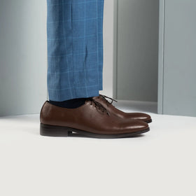 Director Wholecut Brown Leather Shoes